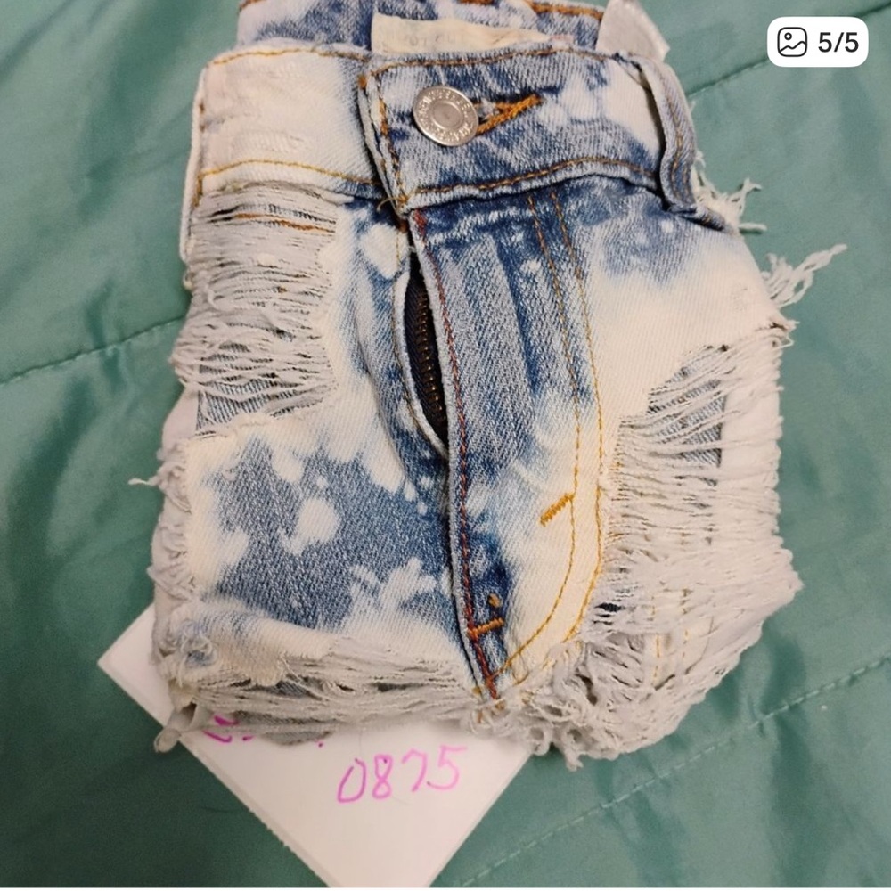Levi's Light Blue Distressed Denim Shorts